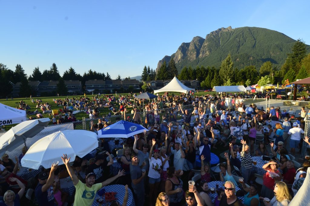 a large crowd gathered at the Festival at Mt. Si